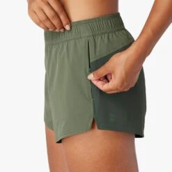 The Atlantique Short | Thyme Colorblock 11 The Atlantique Short | Thyme Colorblock -Fair Harbor Shop F22 ATLANTIQUESHORT GREEN ON FIG 0082 a79822cc c7ca 41b4 bc58 c92d35dce9ca