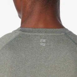 The BreezeKnit™ Tee | Thyme -Fair Harbor Shop SP23 ON FIG BREEZEKNIT HEATHER DARK GREEN 053 9af064ff 085d 46a2 83a9 550a139f995b